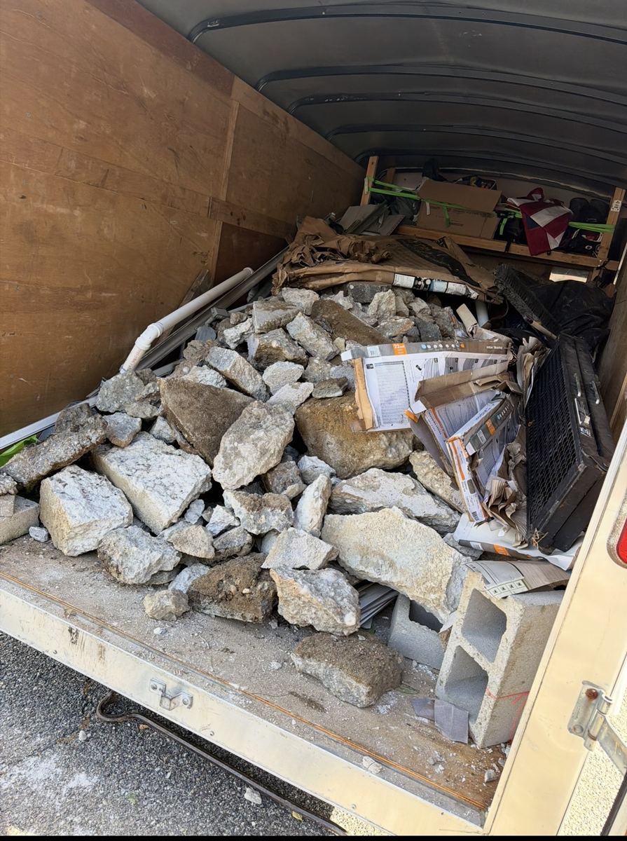 Trailer loaded with concrete and construction debris